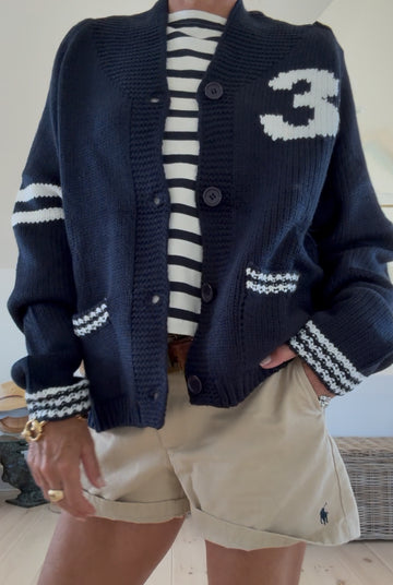 Huddle Up Football Varsity Cardigan In Navy