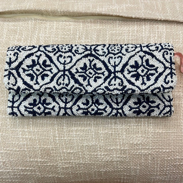 Trellis navy and white beaded clutch