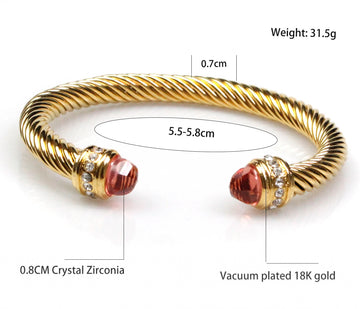 Cable Bracelet in Gold with sapphire blue stone